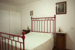 Interior - Red double bedroom