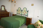 Interior - green double bedroom
